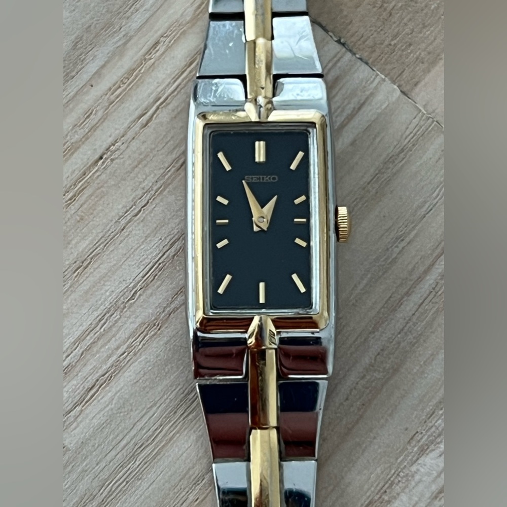 Seiko Ladies Luxury Watch Two-Tone Bracelet Black Rectangular Dial Gold Markers